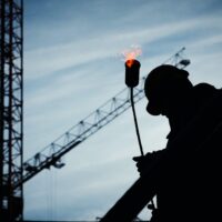 silhouette of plant worker